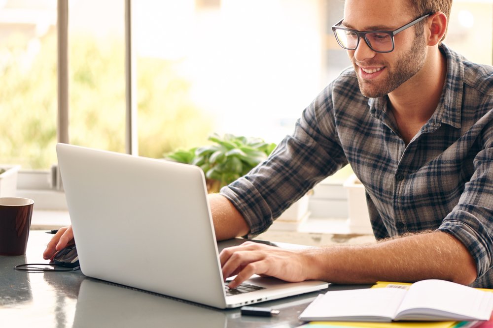 Man Working On Laptop